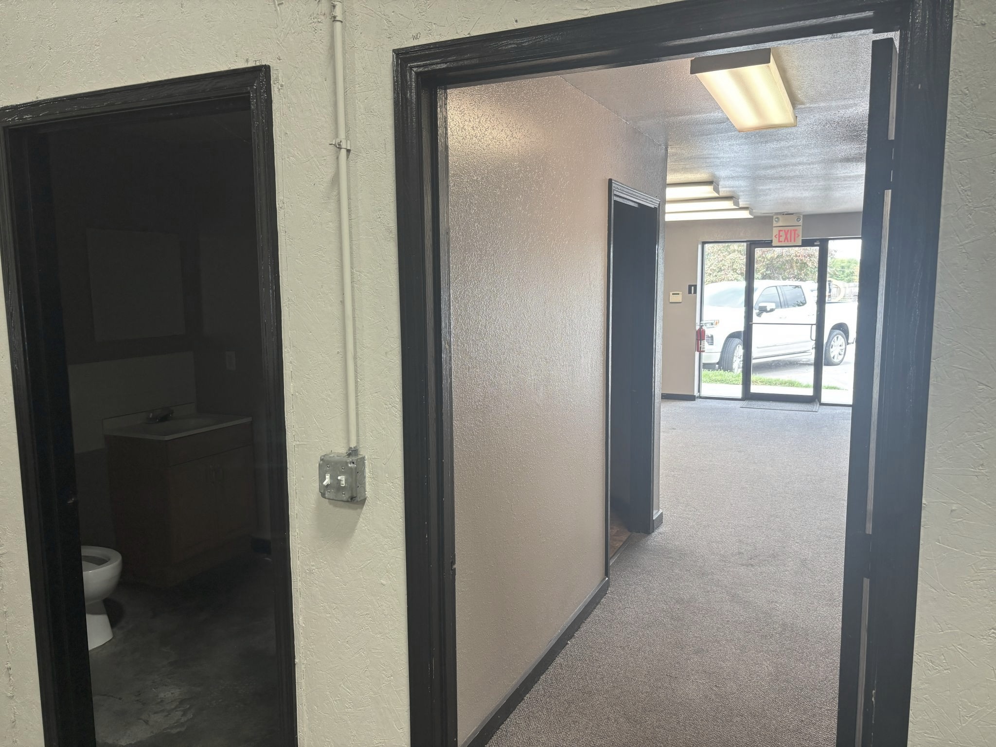 23rd St Suite 1 Warehouse Restroom and Hall